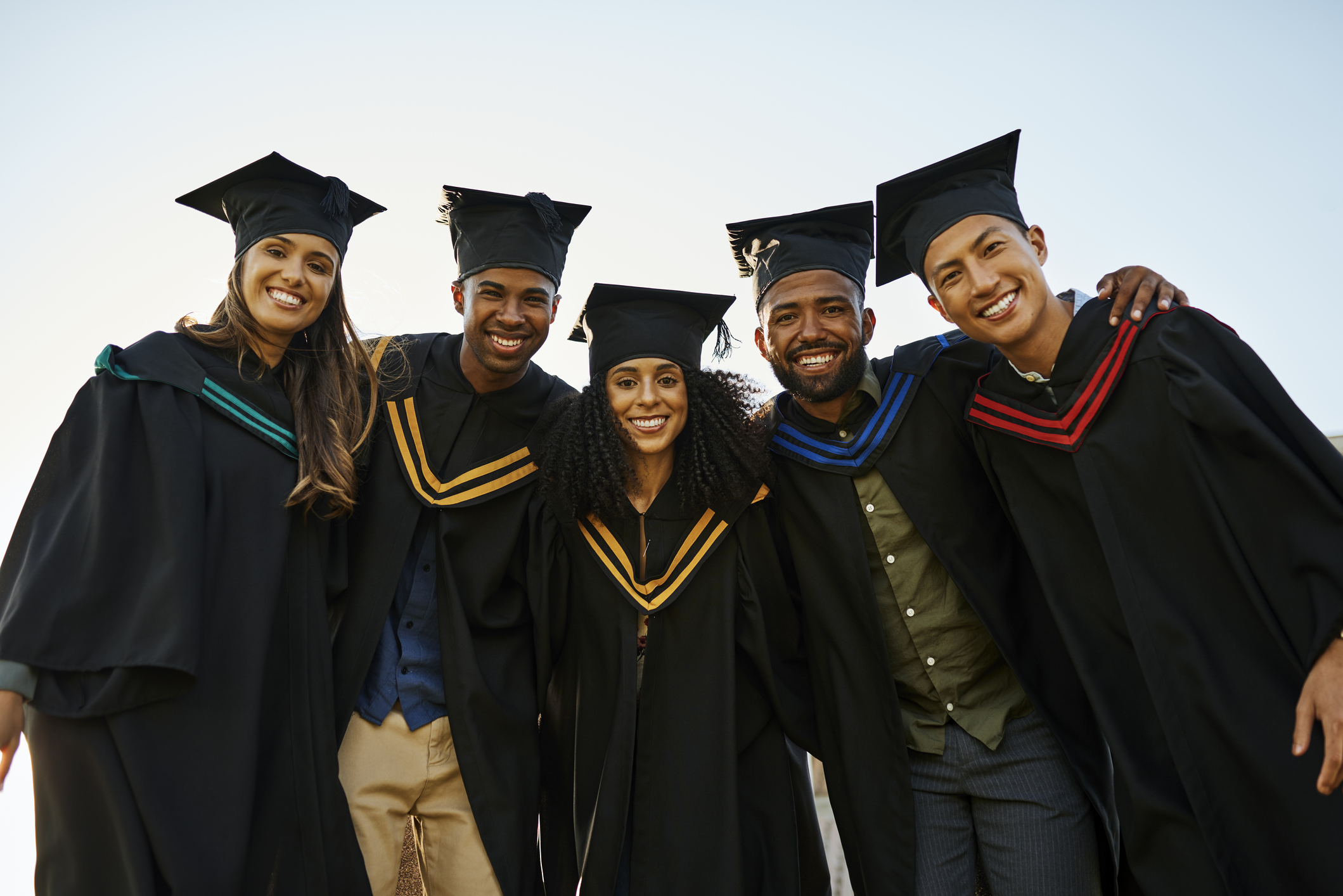 Students in graduation caps and gowns