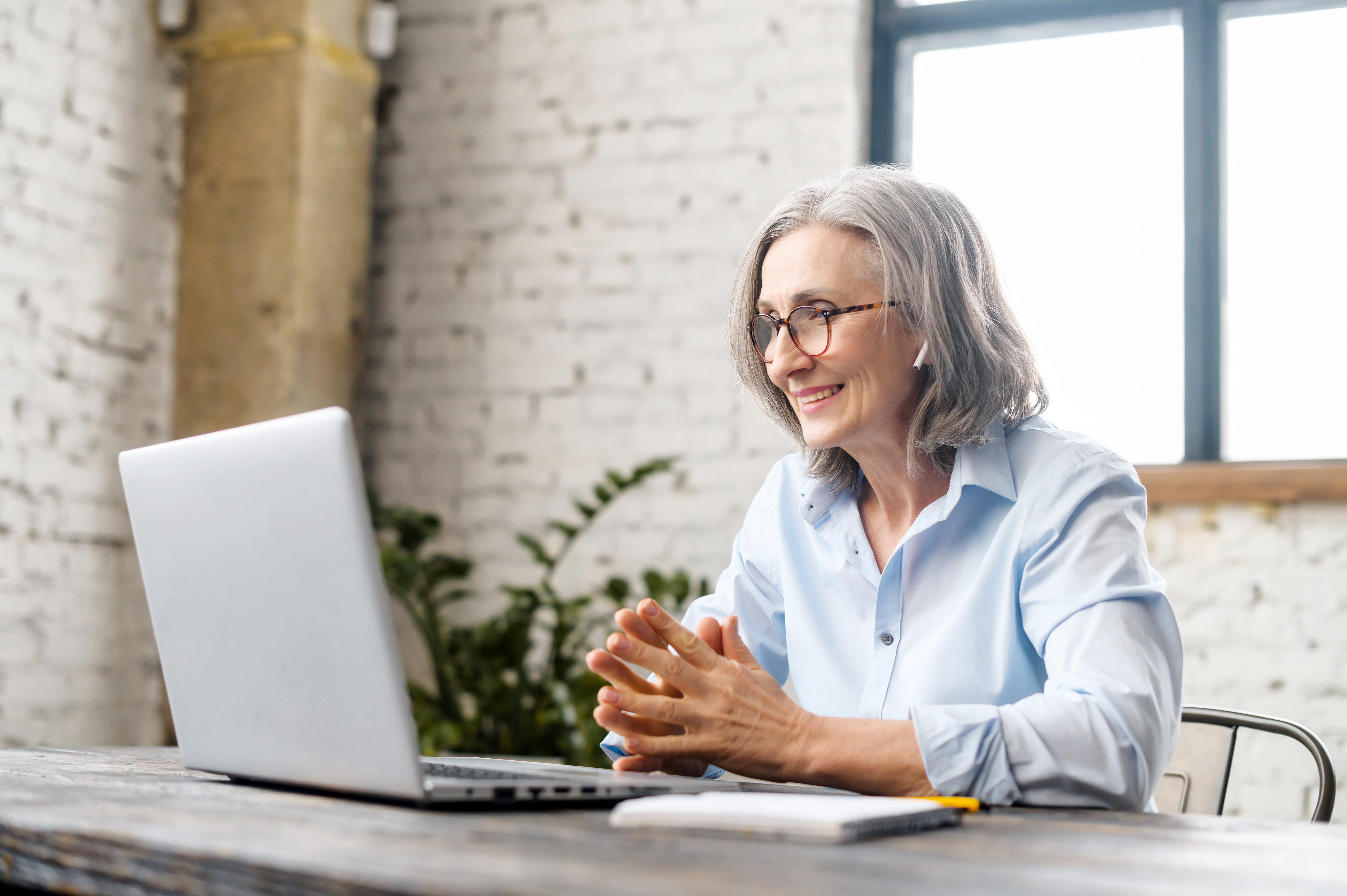 Woman seated at laptop